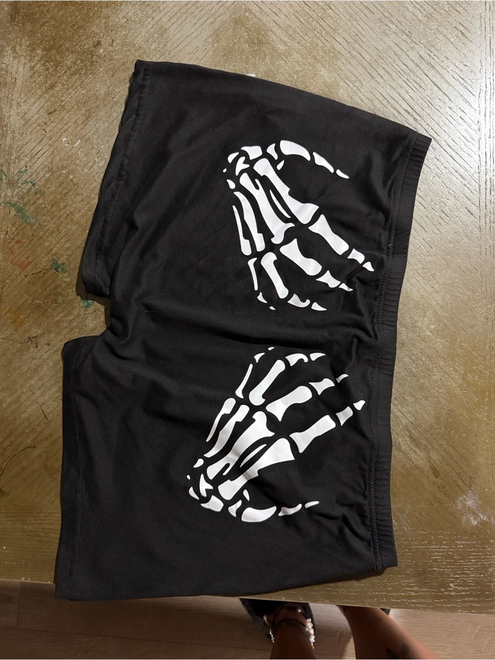 SHEIN Black Shorts with White Skeleton Hands